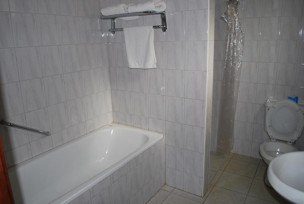Parkview Inn Moshi Quarto foto