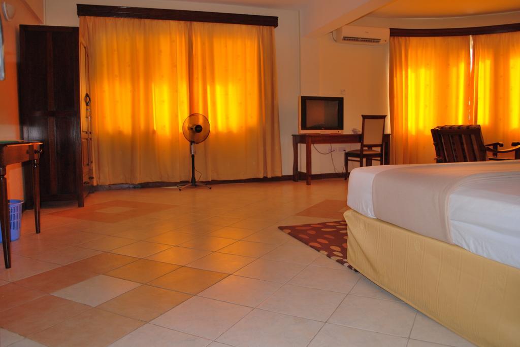 Parkview Inn Moshi Quarto foto