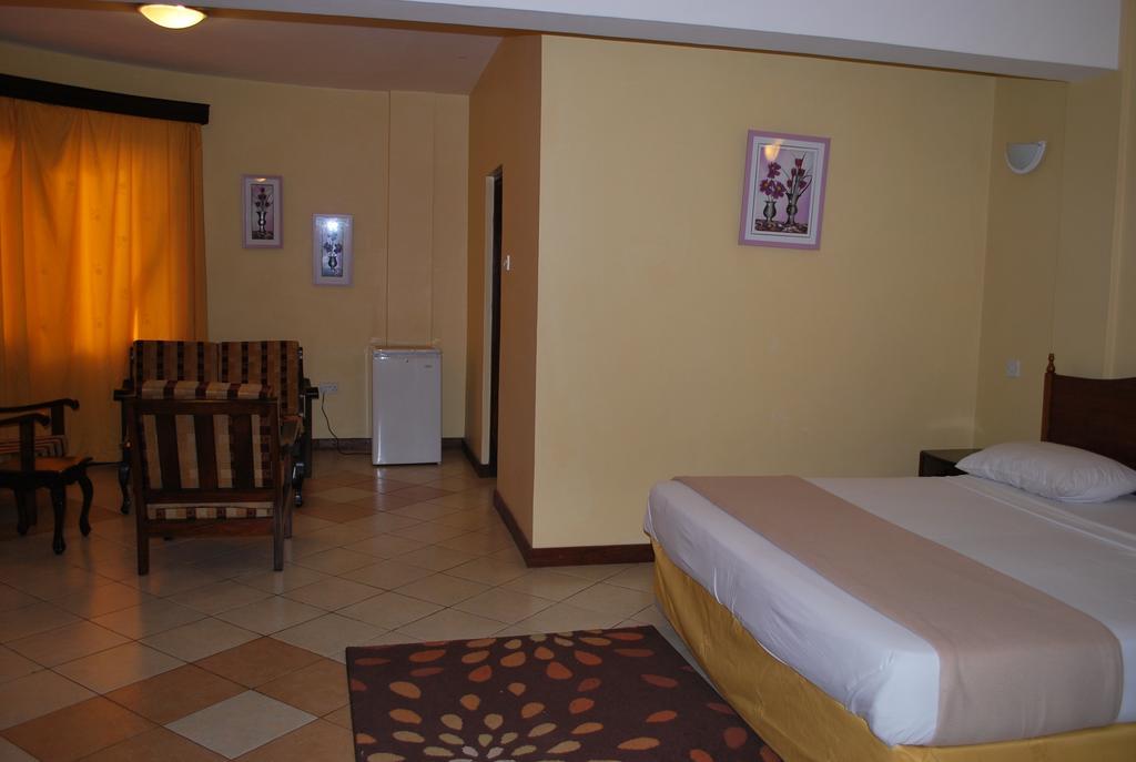Parkview Inn Moshi Quarto foto