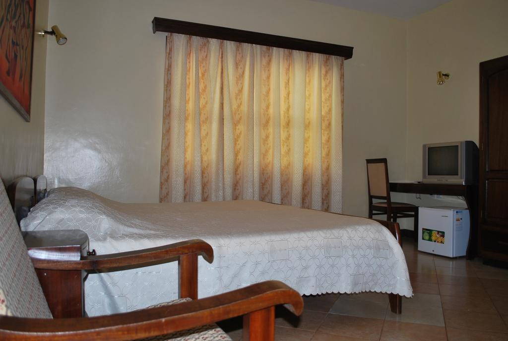 Parkview Inn Moshi Quarto foto