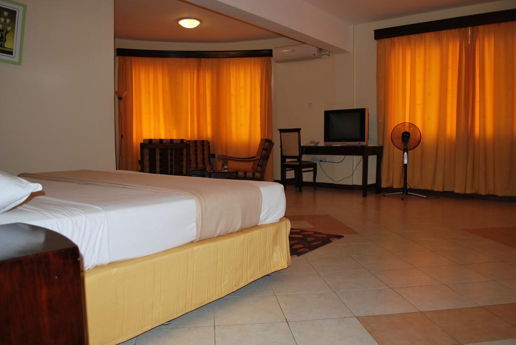 Parkview Inn Moshi Quarto foto
